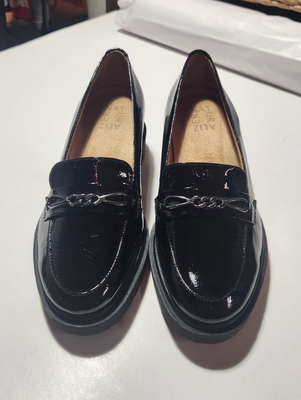 Women size six Naturalizer Black Patent Loafers with Chain Detail